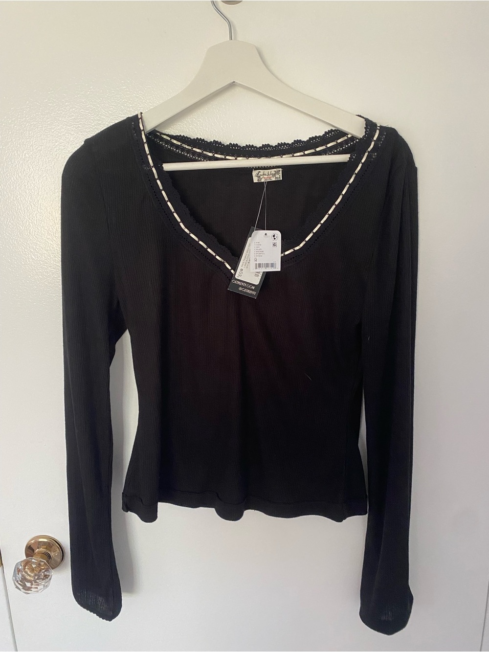 Free People Black Ribbed V‑Neck Long Sleeve Top with Lace Trim